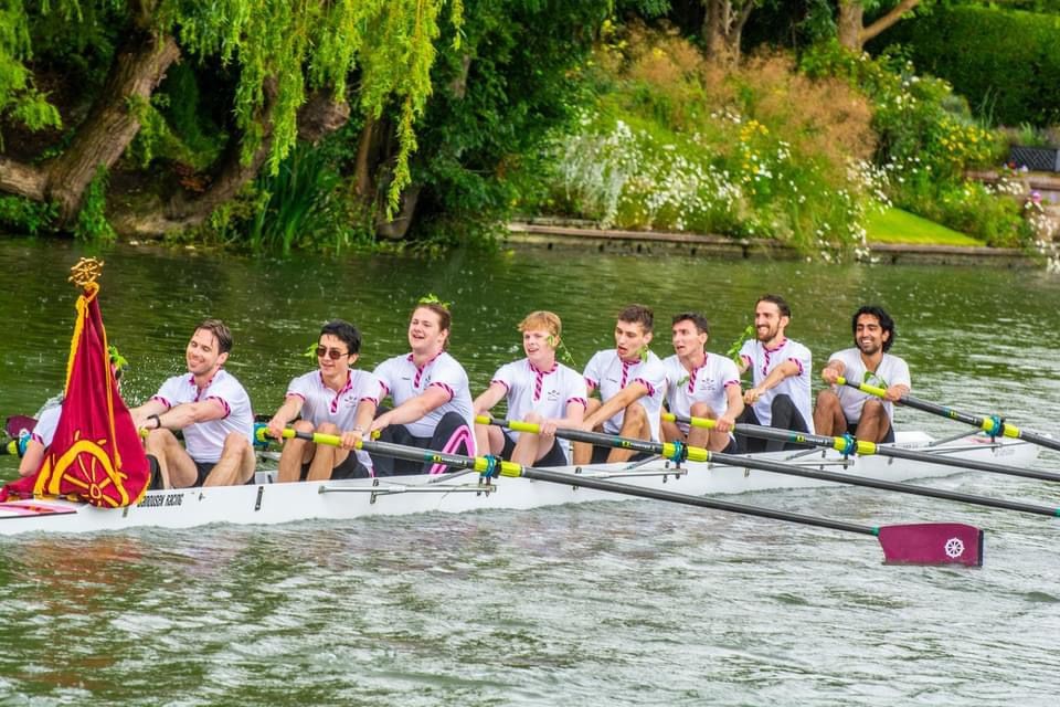 St Catharine's College M3 crew with flag denoting blades at the 2024 May Bumps