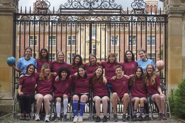St Catharine's, Gonville & Caius and Hughes Hall women's and non-binary football team in front of the St Catharine's main gates