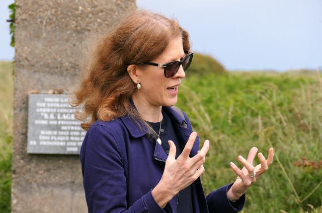 Dr Gilly Carr speaking at the site of SS Lager Sylt on Alderney