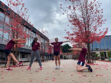 St Catharine's women's badminton team spelling out C-A-T-Z