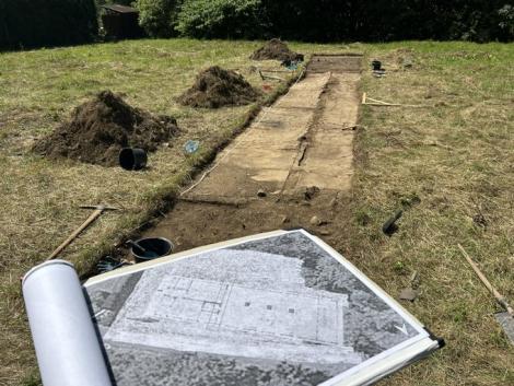 Excavation at Svatava, showing a trench and map