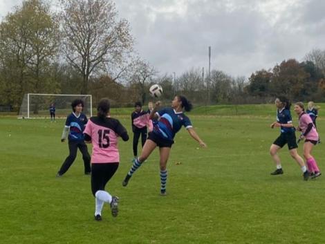 St Catharine's, Gonville & Caius and Hughes Hall women's and non-binary football team in action