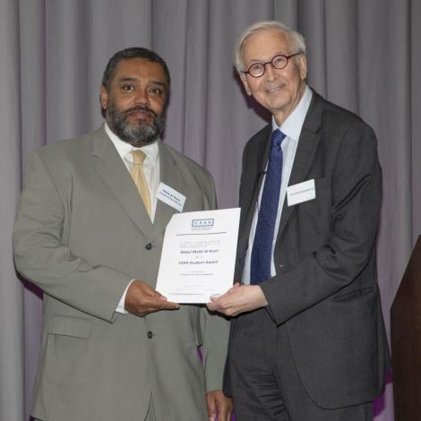 Malik Al Nasir collects CSAR Student Award from Professor Sir Colin Humphreys